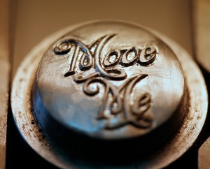 Close-up of hand engraved die.