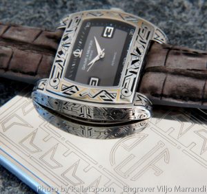engraved Baume and Mercier watch